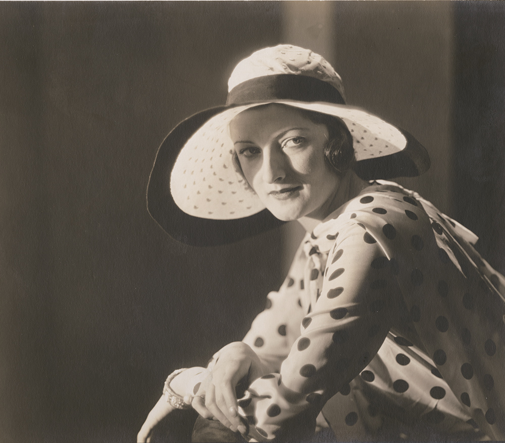 Vogue Magazine Photographer - Woman in Polka Dot Shirt and Hat Vogue Magazine Photographer - Woman in Polka Dot Shirt and Hat